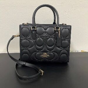 Black Coach tote.  Small Maggie.